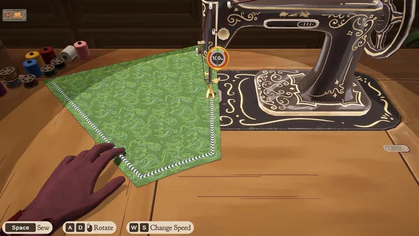 Sewing fabric at the machine in Dressmaker